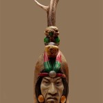 botella de vidrio decorada inca